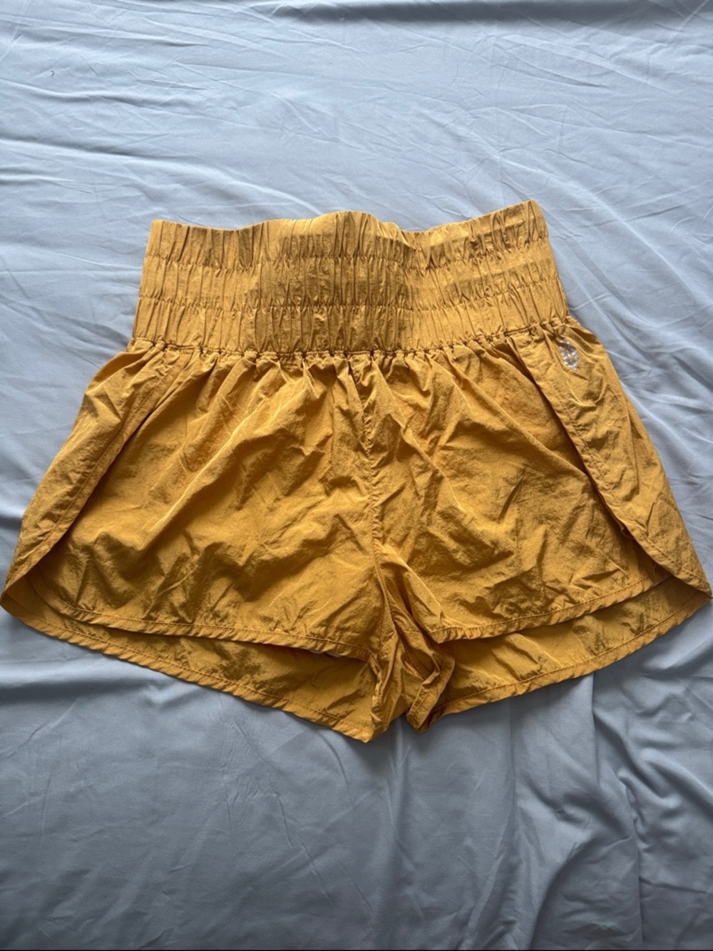 FP Movement by Free People High-Waist Athletic Shorts in Gold